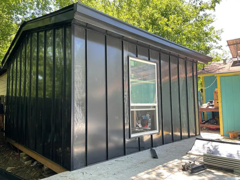 Black standing seam metal wall panels for Roof Inspection in Boulder